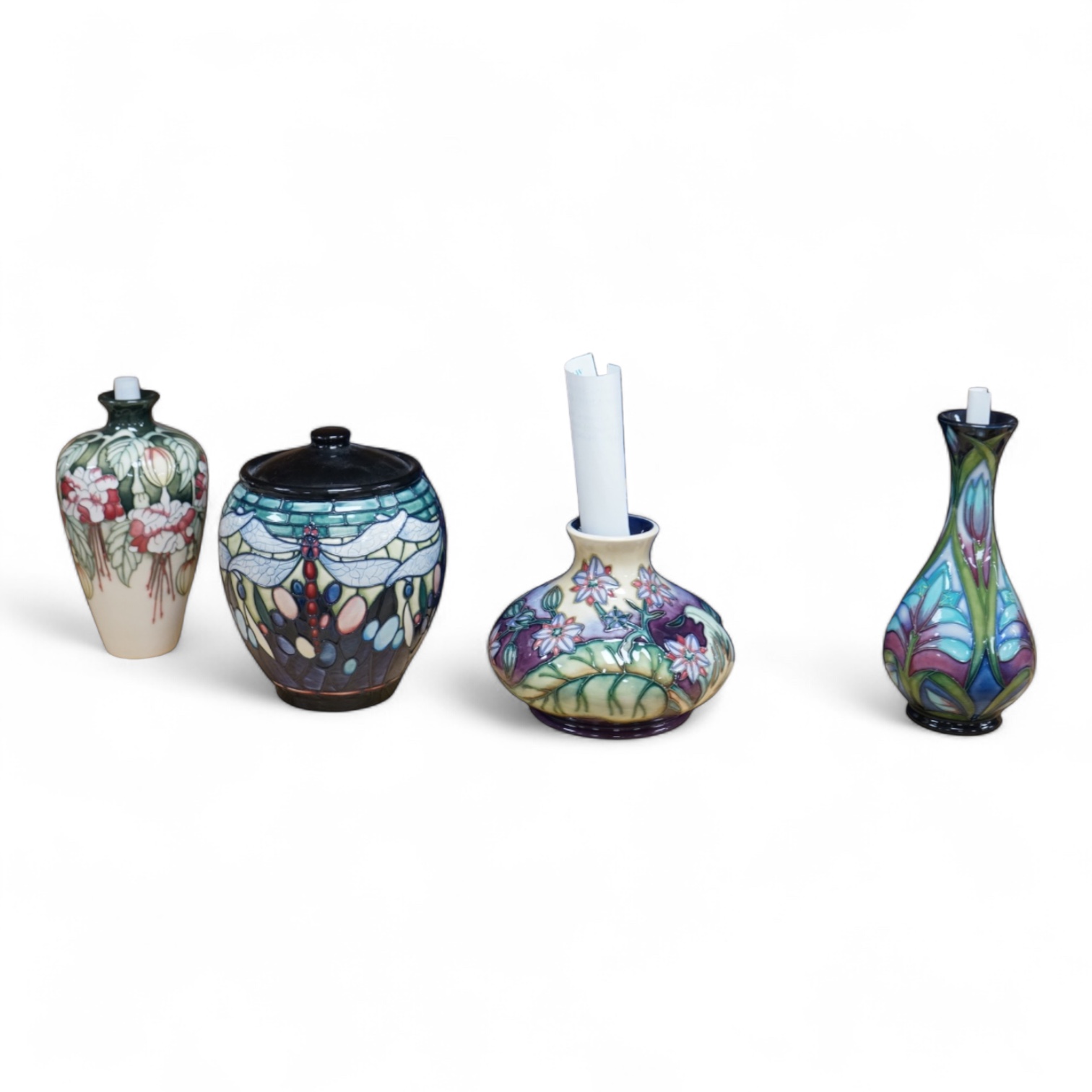 Four Moorcroft vases: Favrile Jar, Kerry vase, Cleopatra vase and a Borage vase. All boxed, tallest 17cm